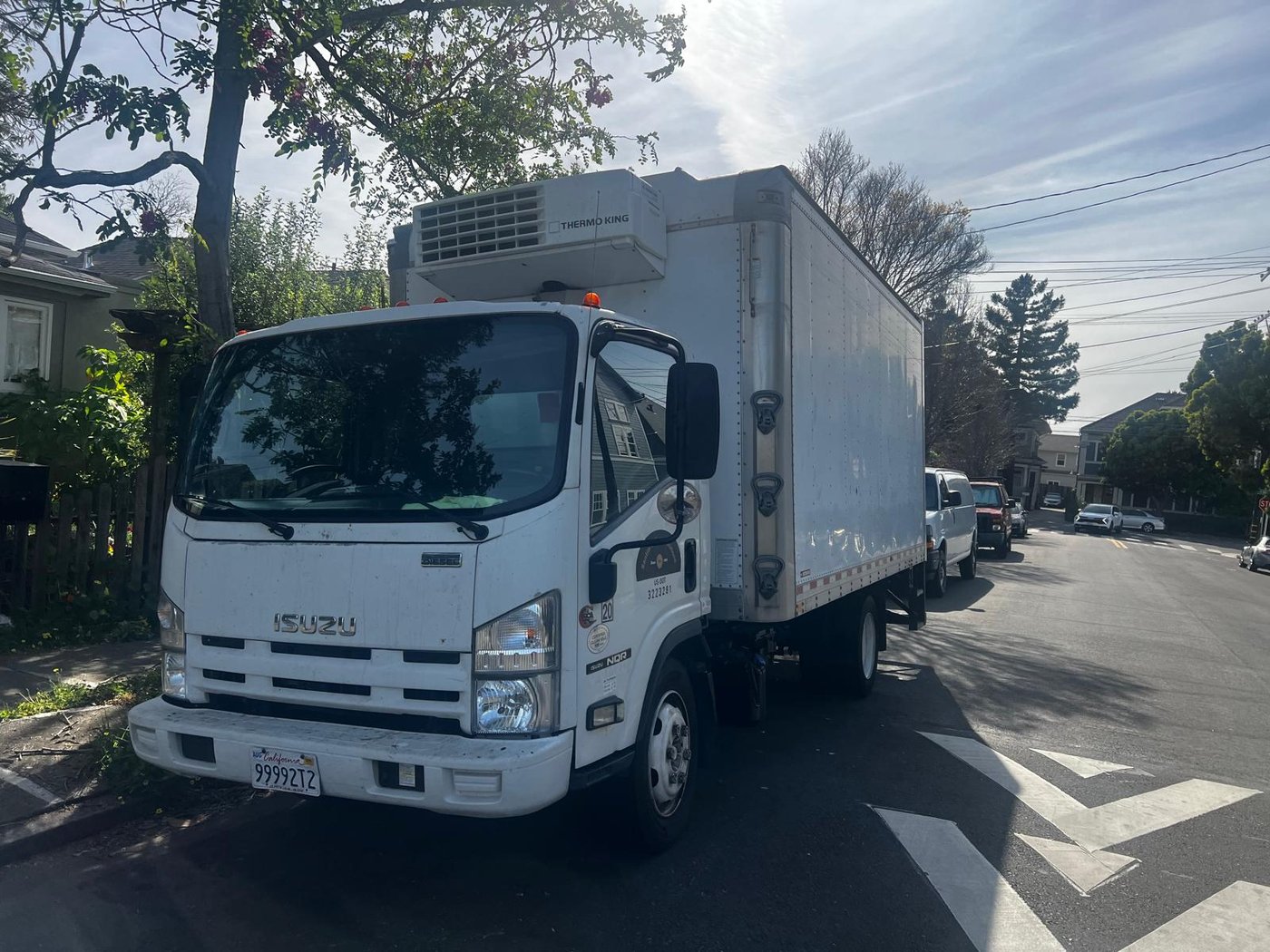 Santini Delivery Solutions Isuzu refrigerated truck on California street